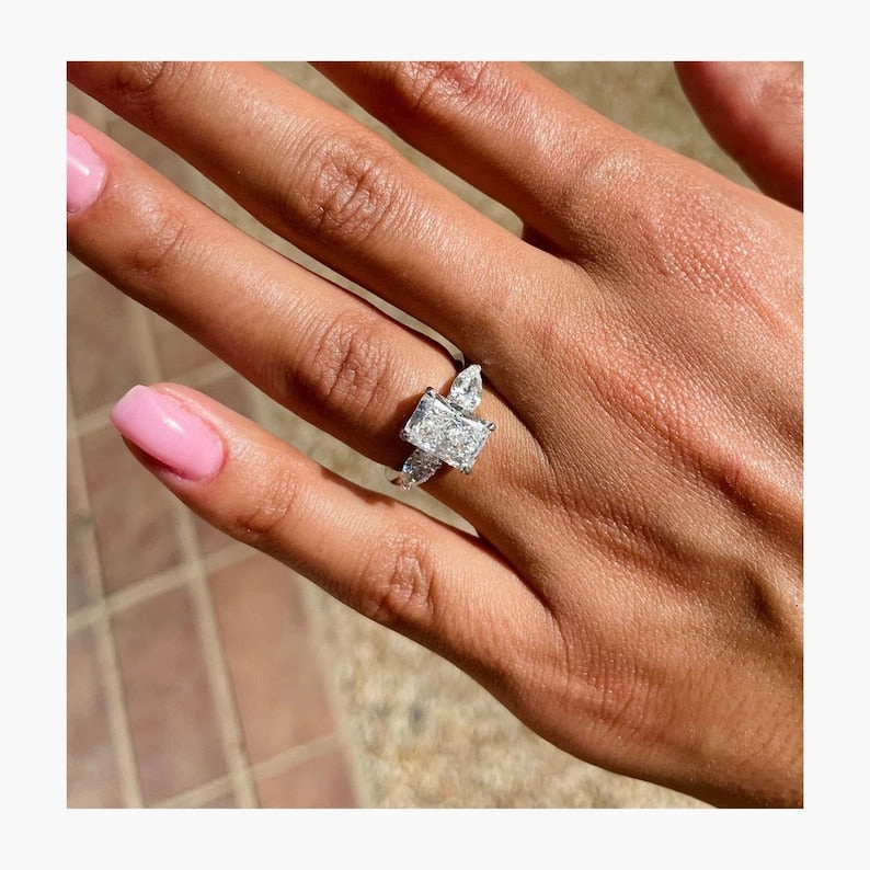 Classic 2.0 CT Radiant Moissanite Engagement Ring with Three Stone Design