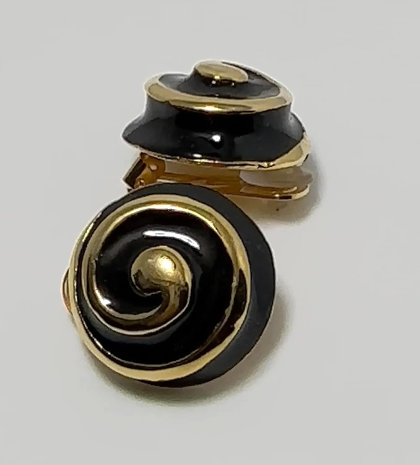Kenneth Jay Lane, Black, White, or Red Enamel Clip Earrings with Gold Swirl Accent
