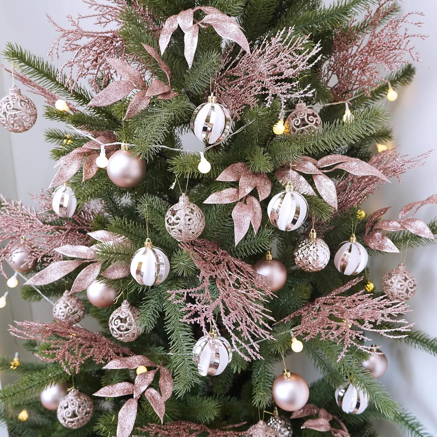 Winlyn 30 Pcs Christmas Artificial Bay Leaf Picks Cedar Sprays Rose Gold Glittered Christmas Tree Ornament Picks Winter Floral Stems for Rose Gold Christmas Tree Seasonal Wreath Wedding Centerpiece